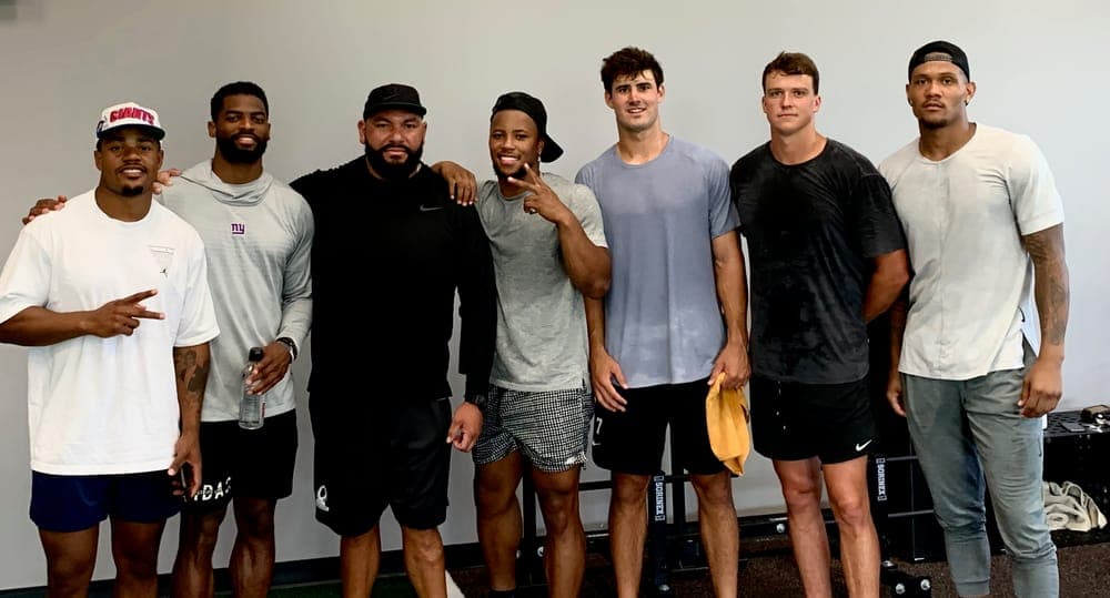 Coach Jason with athletes he has trained